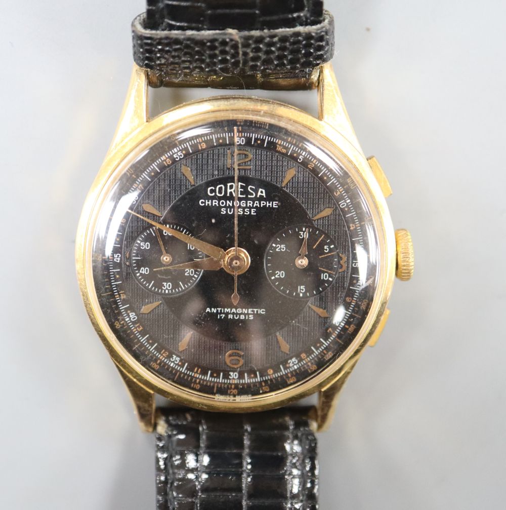 A gentlemans 1960s? 18k Coresa chronograph manual wind wrist watch, on later strap.